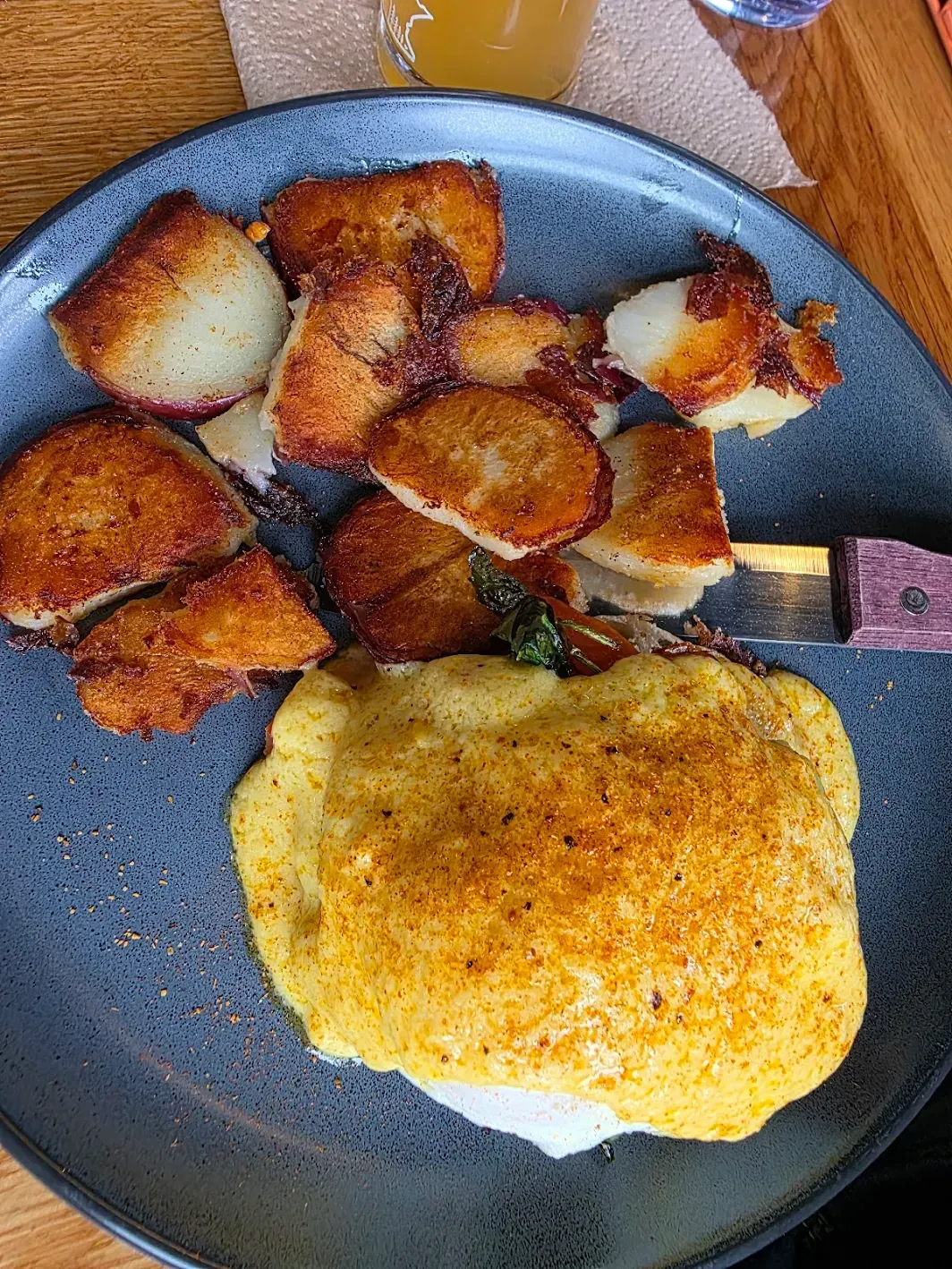 Eggs Benedict with American fries at The Phattest