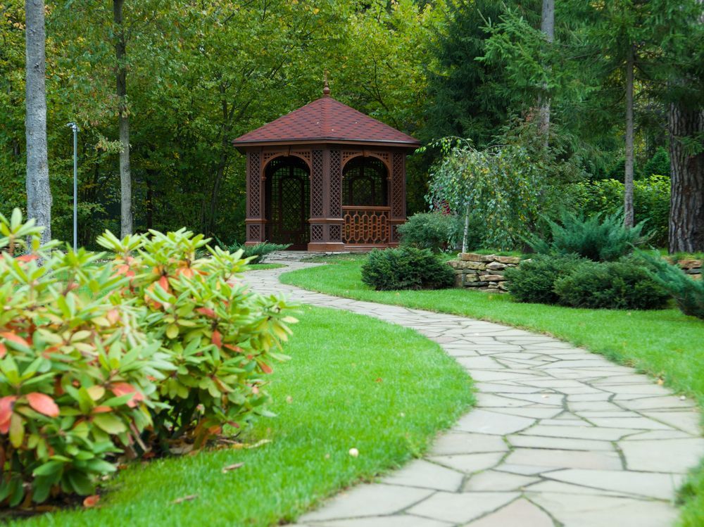 There is a gazebo in the middle of the park.