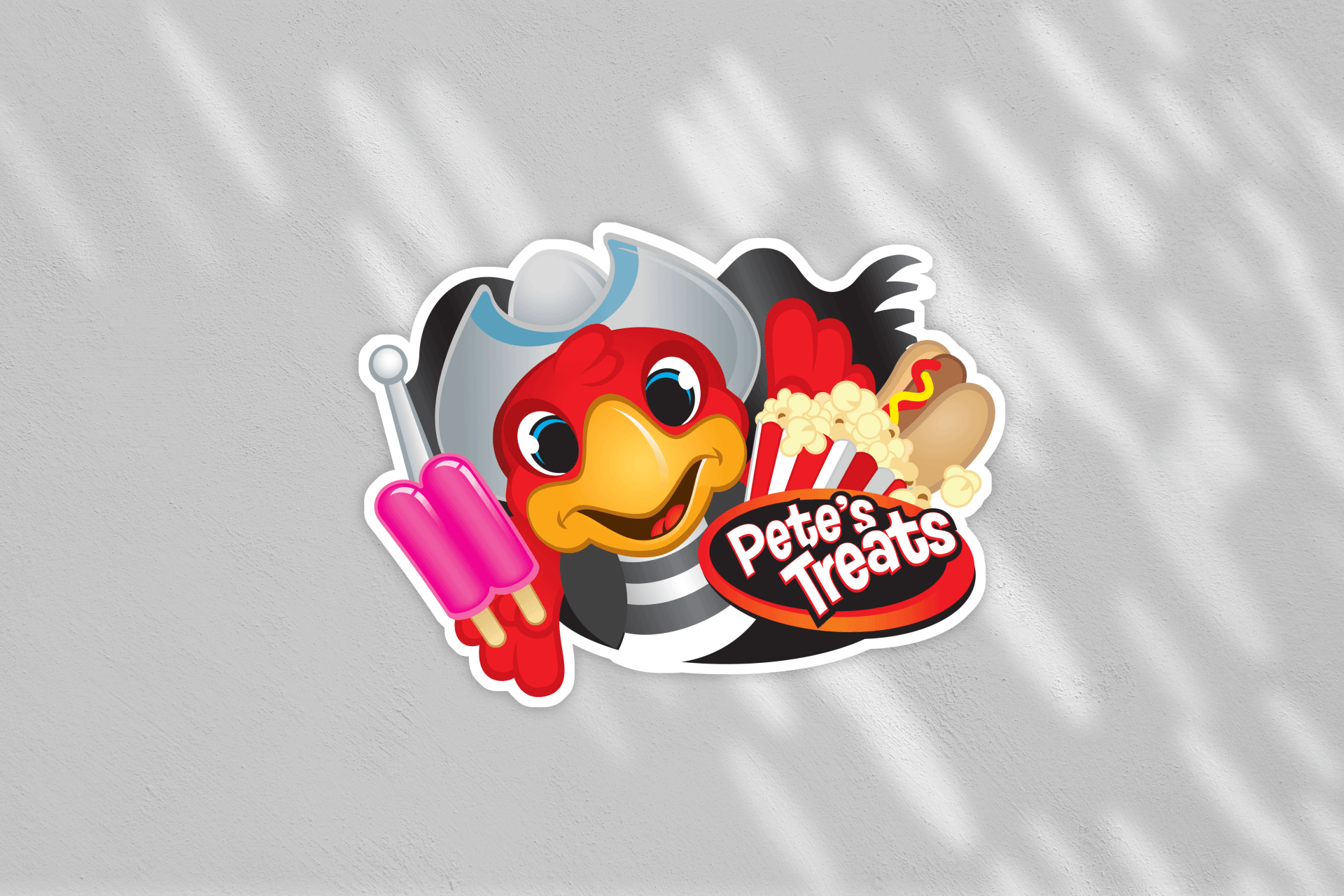 A sticker of a bird holding a hot dog and ice cream.