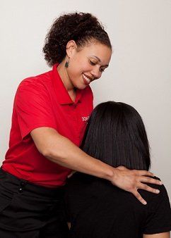 Pediatric Therapy — Nurse and Woman Holding Dumbell in Newport News, Virginia Pediatric Therapy — Nurse and Woman Holding Dumbell in Newport News, Virginia