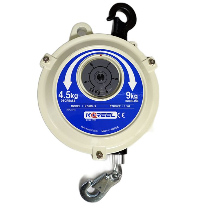 Tool balancer by Koreel retractable safety reel with black hook and metal clip on a white background