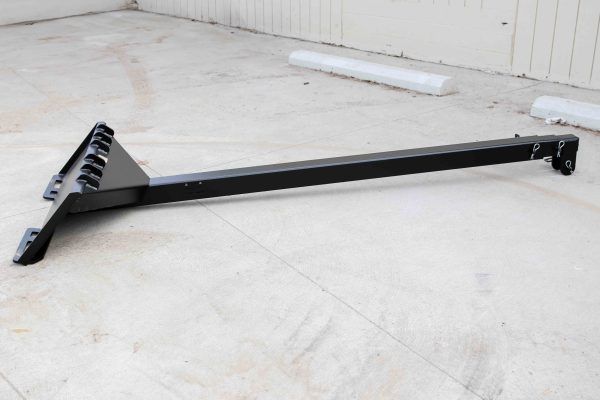 A black metal bar with a handle on a white background.