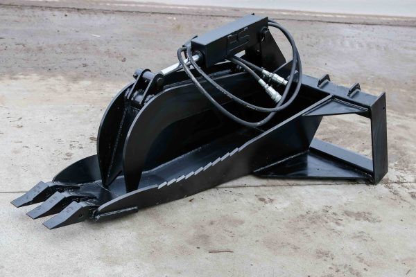 A black bucket with a hose attached to it