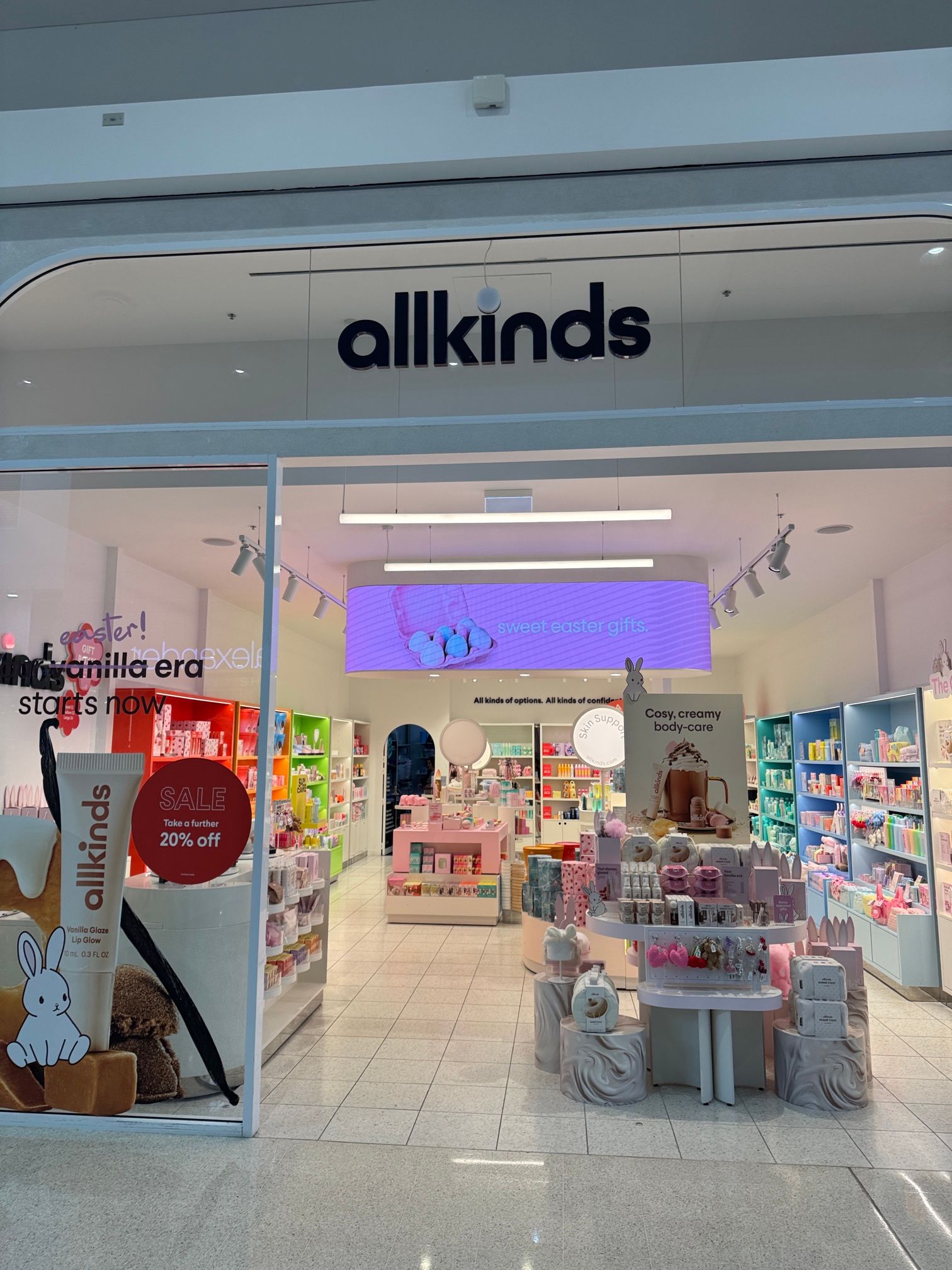 Allkinds storefront with colorful displays and products inside a bright retail shop