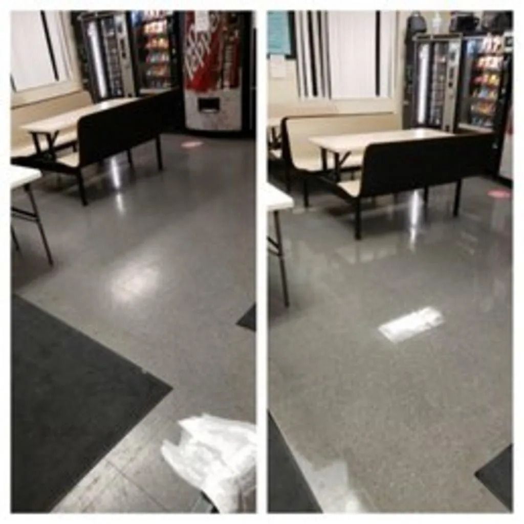 Store floor with benches and a vending machine, showing a shiny wet patch on the tile.