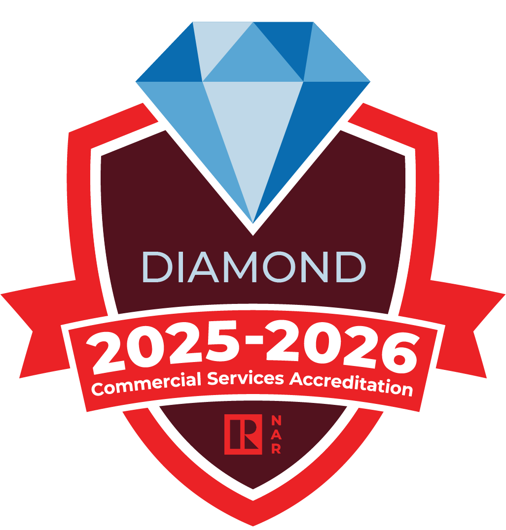 Diamond Commercial Services Accreditation badge, featuring a blue diamond on a burgundy shield, red ribbon with dates 2025-2026, and NAR logo.