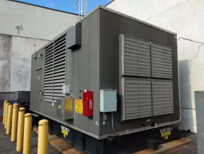 OE Services LLC - A large gray generator set with the word eagle on it