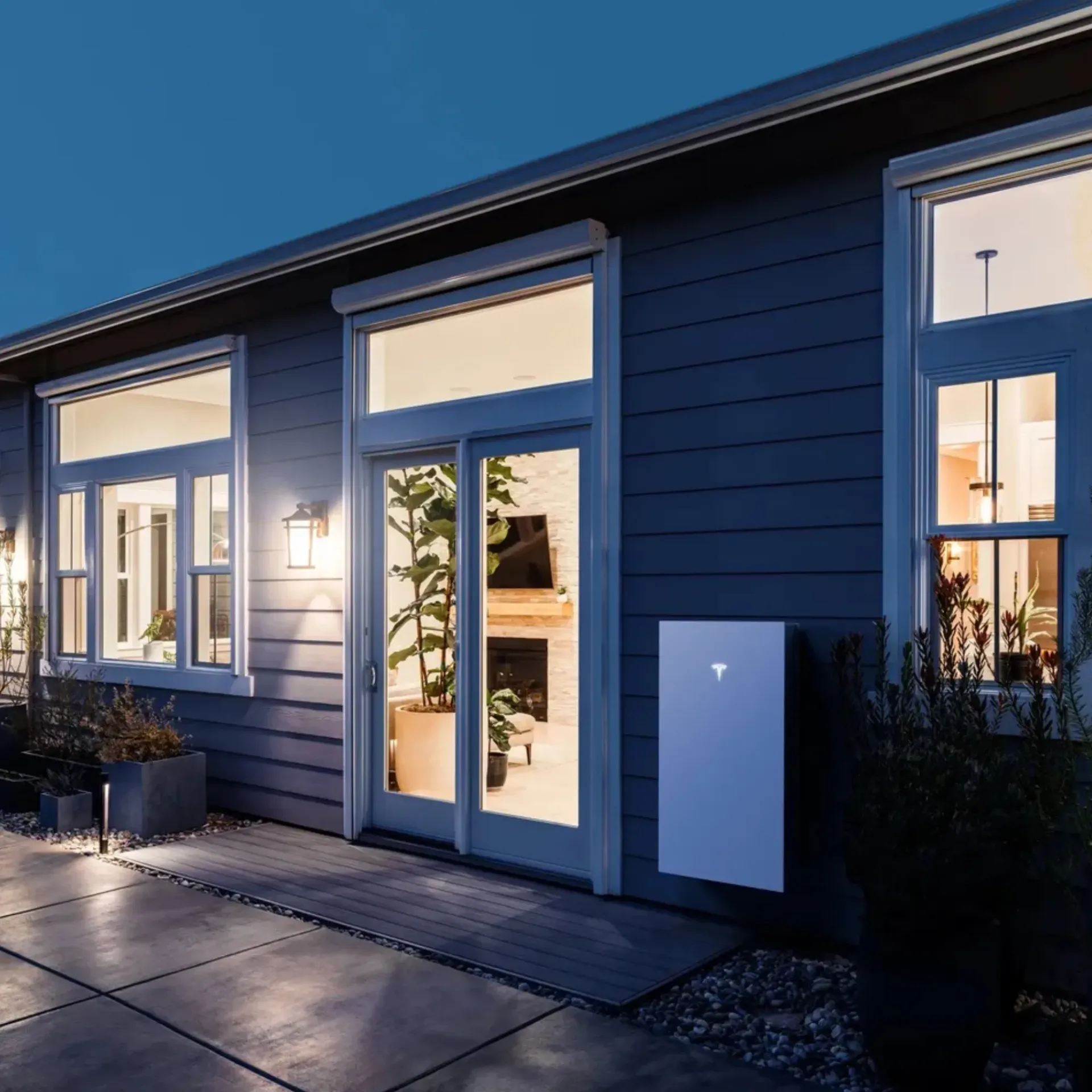 OE Services LLC - A house with a solar panel on the side of it