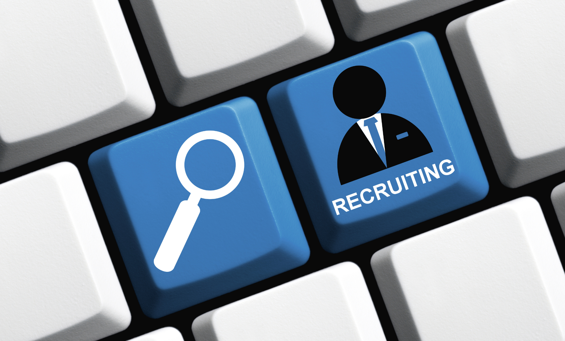 Keyboard keys: magnifying glass and person icon labeled 