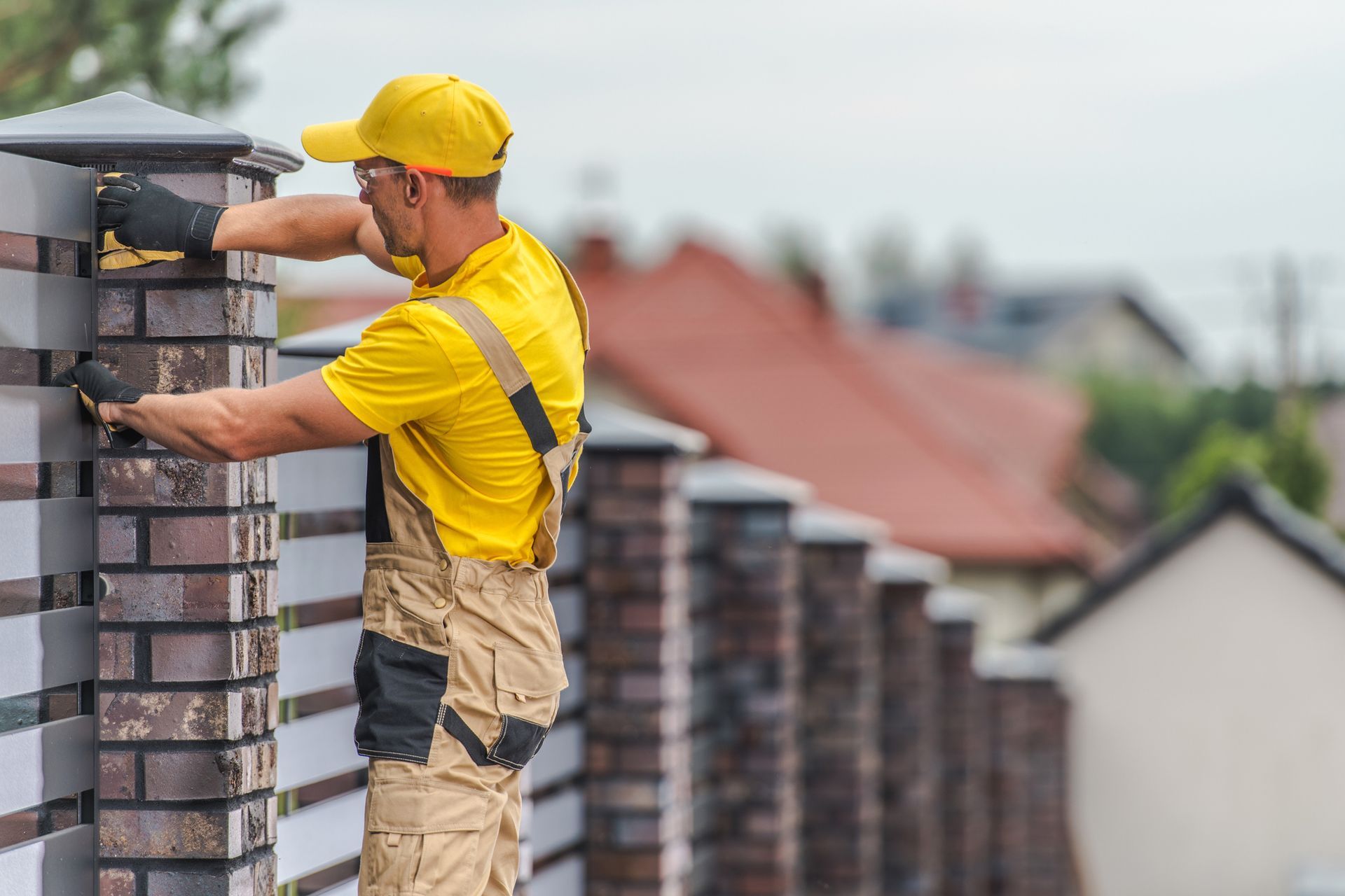 Man installing fence