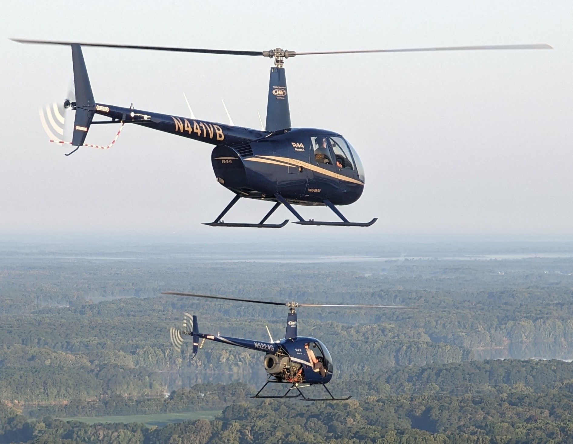 Two Helicopters Flying Together