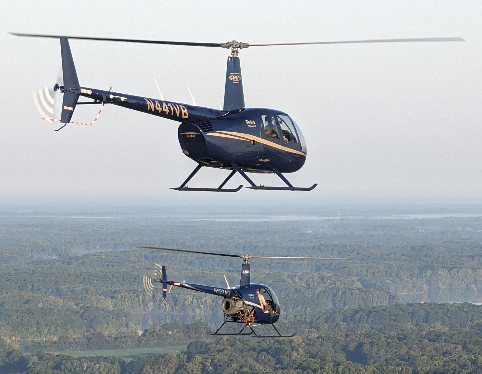 Two Helicopters Flying together