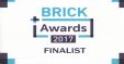 Brick Awards 2011 finalist logo in blue and black text with a small blue plus sign.