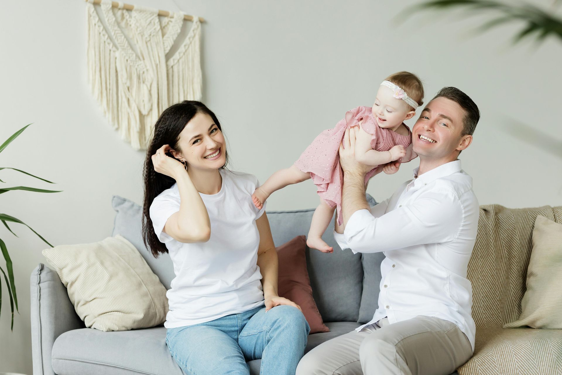 Family relaxing in a clean living room after professional house cleaning in Brisbane