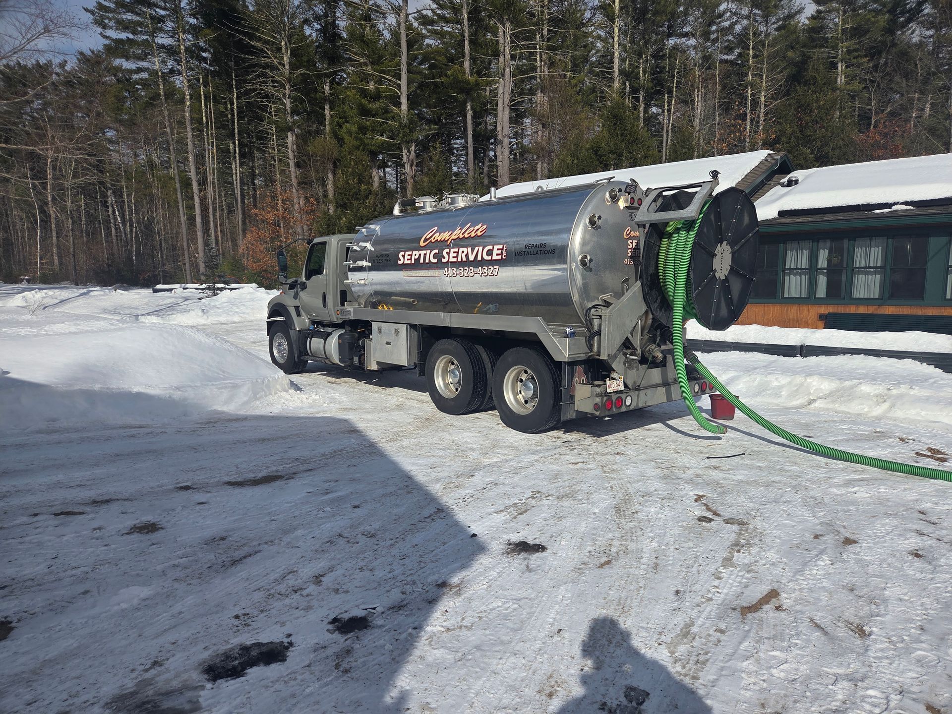 Complete Septic Service pump truck on site in Palmer MA