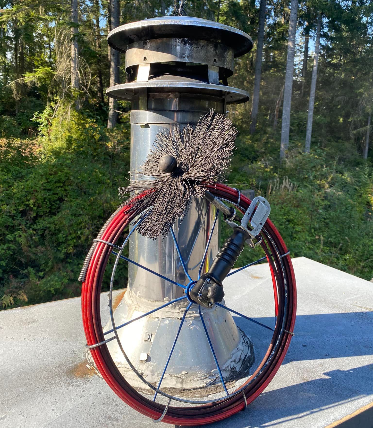 Cleaning the Hearth in the Fireplace — Burley, WA — Dave's Chimney Service LLC Cleaning the Hearth in the Fireplace — Burley, WA — Dave's Chimney Service LLC