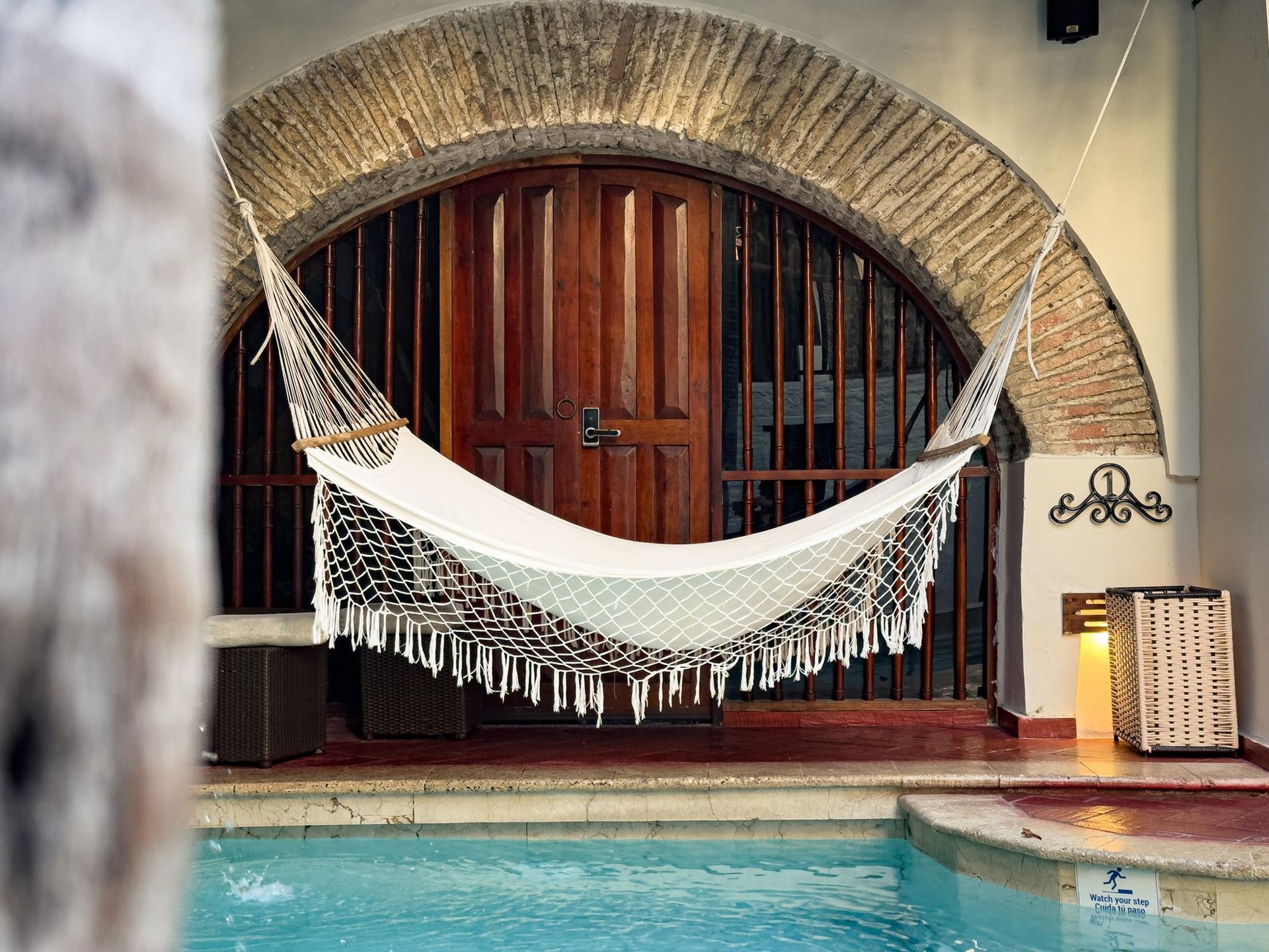 Hammock by the pool at Casa Bugó boutique hotel in the Walled City