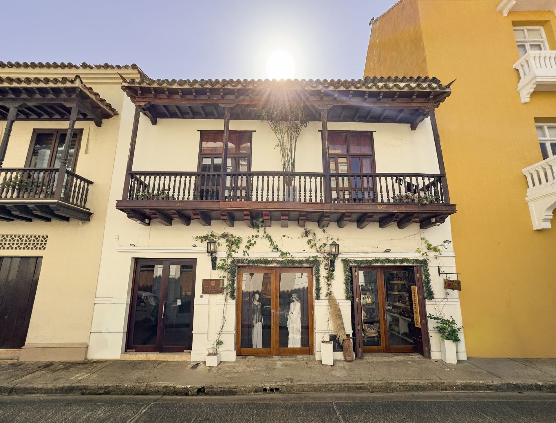 Colonial facade of Casa Bugó hotel on Calle del Cuartel, Cartagena