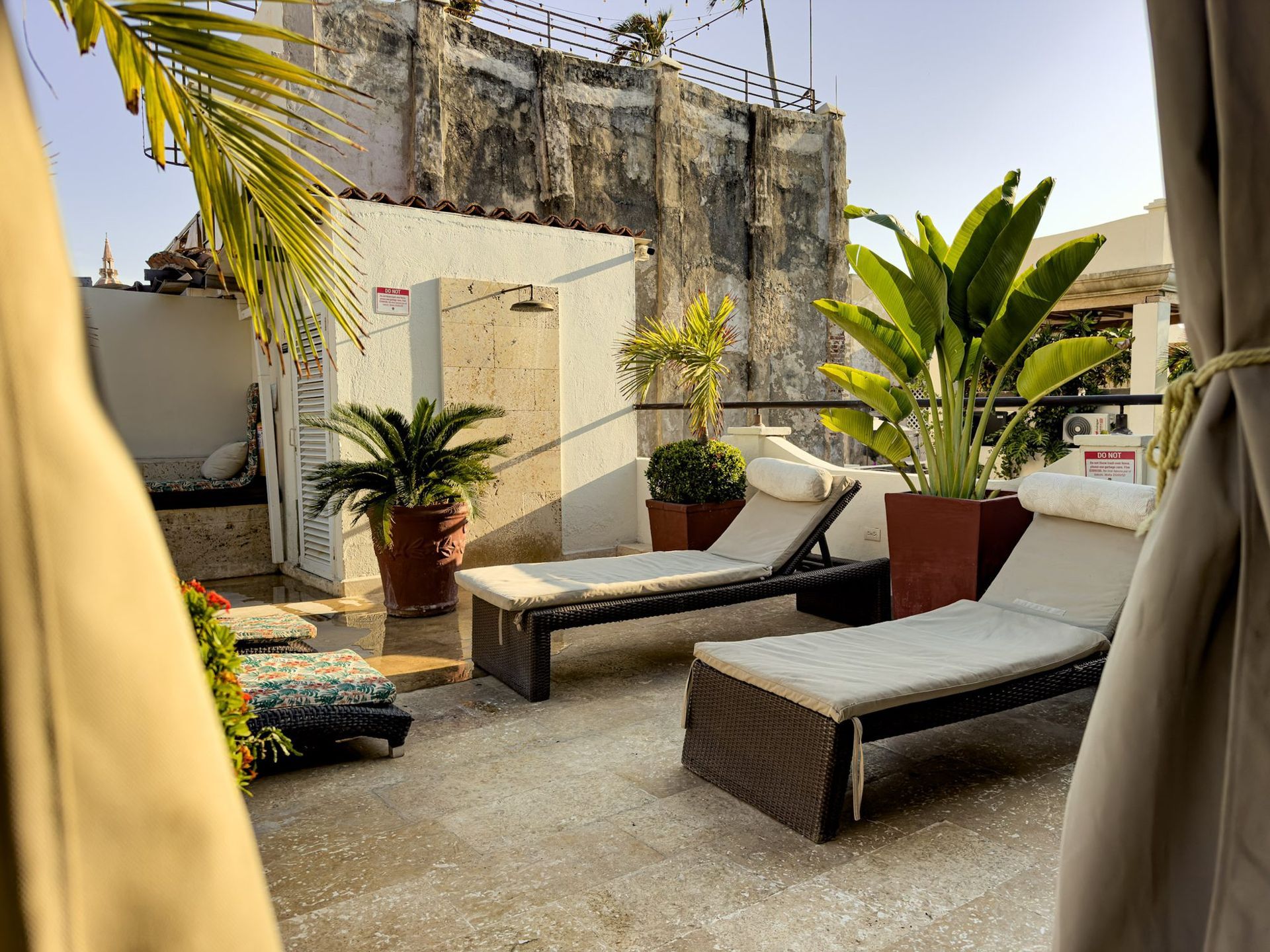 Terrace with palm trees at Casa Bugó, Cartagena Old City