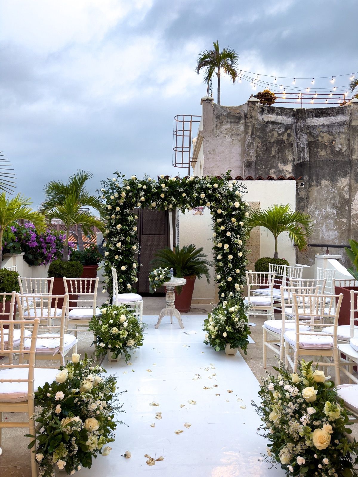 Flower arch for a wedding ceremony at Casa Bugó