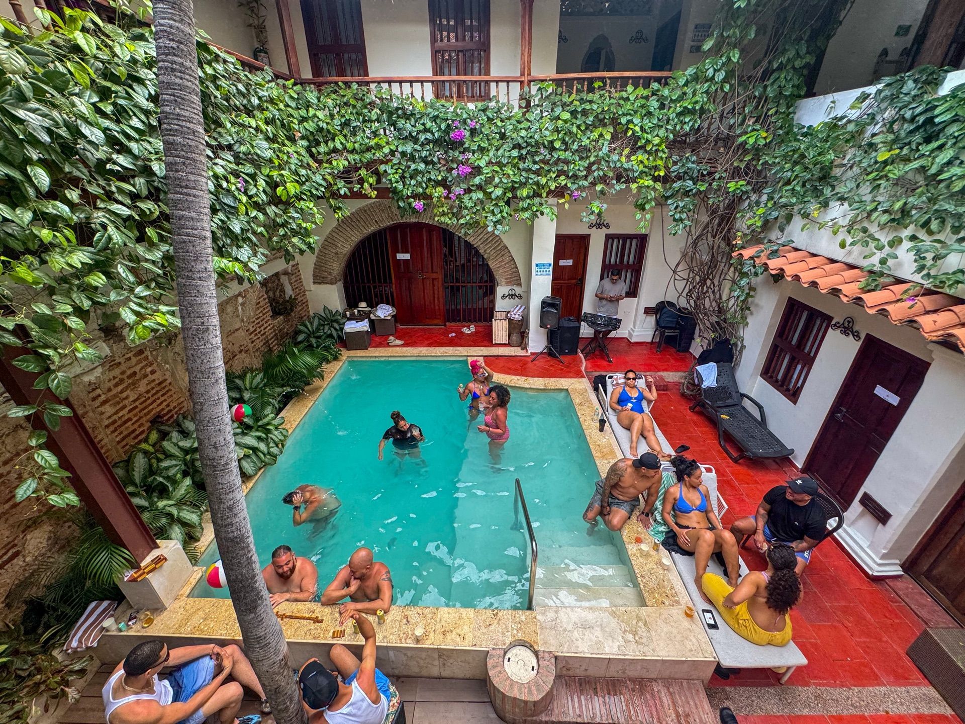Group of friends enjoying the private pool at Casa Bugó, Cartagena Historic Center