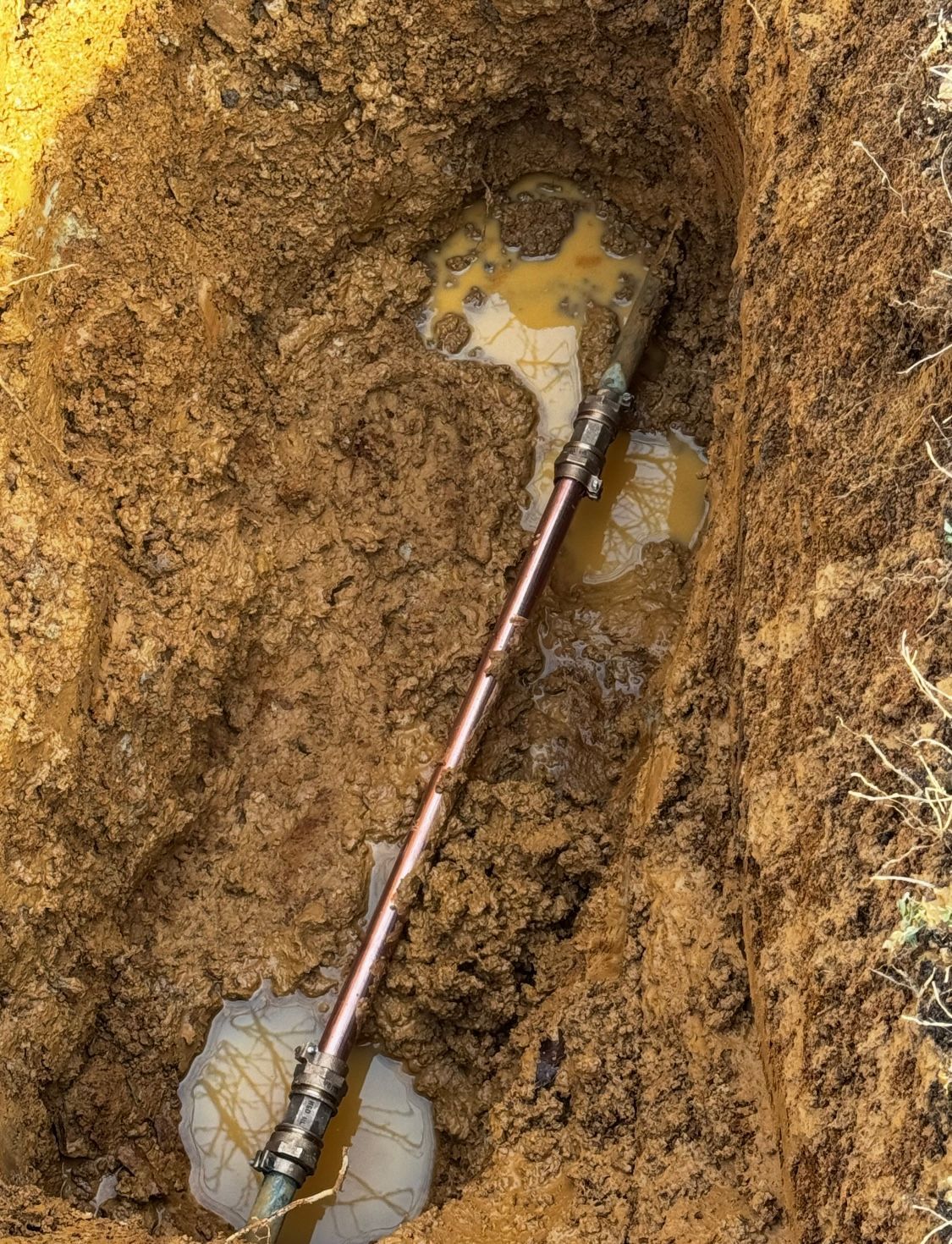 A water line service in Charlottesville, VA by Quality Plumbing