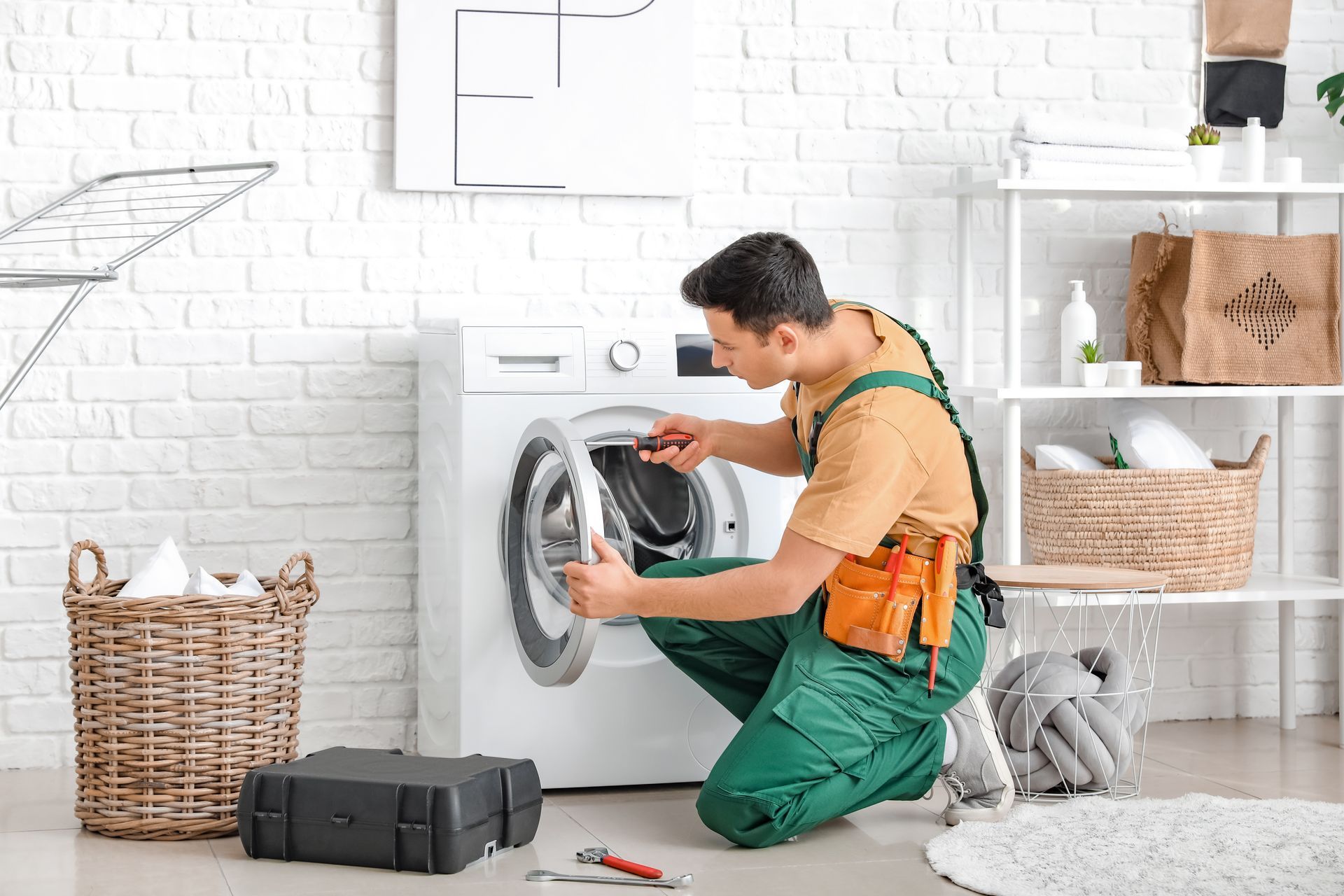 Technician in Green Work Clothes — Eurocoast Appliance Service In Gosford, NSW