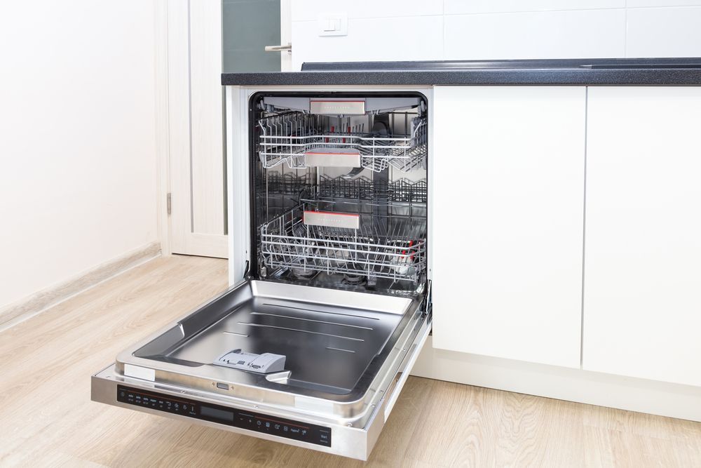 Open, Built-in Stainless Steel Dishwasher Installed in a Modern Kitchen — Eurocoast Appliance Service In Woy Woy, NSW