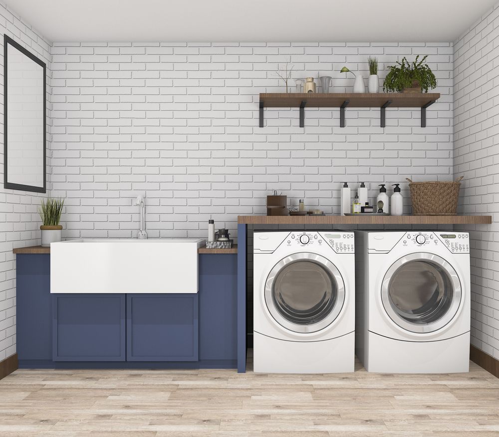 Laundry Room With a White Farmhouse Sink, Blue Cabinets — Eurocoast Appliance Service In Woy Woy, NSW