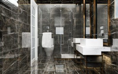 Luxurious bathroom with dark marbled walls, glass shower, white sink, and toilet.