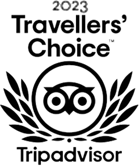 Logotipo do prêmio Travellers' Choice do TripAdvisor 2023 com coroa de louros e ícone de coruja