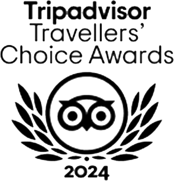 Logotipo do prêmio Travellers' Choice do TripAdvisor 2024 com coroa de louros e ícone de coruja.