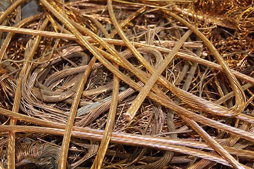 Close-up of tangled brown and tan straw or dry grass covering the ground