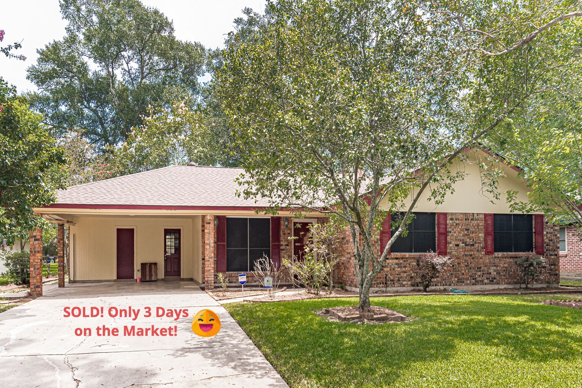 Single-story house with a front yard and driveway, marked “SOLD!” in red text