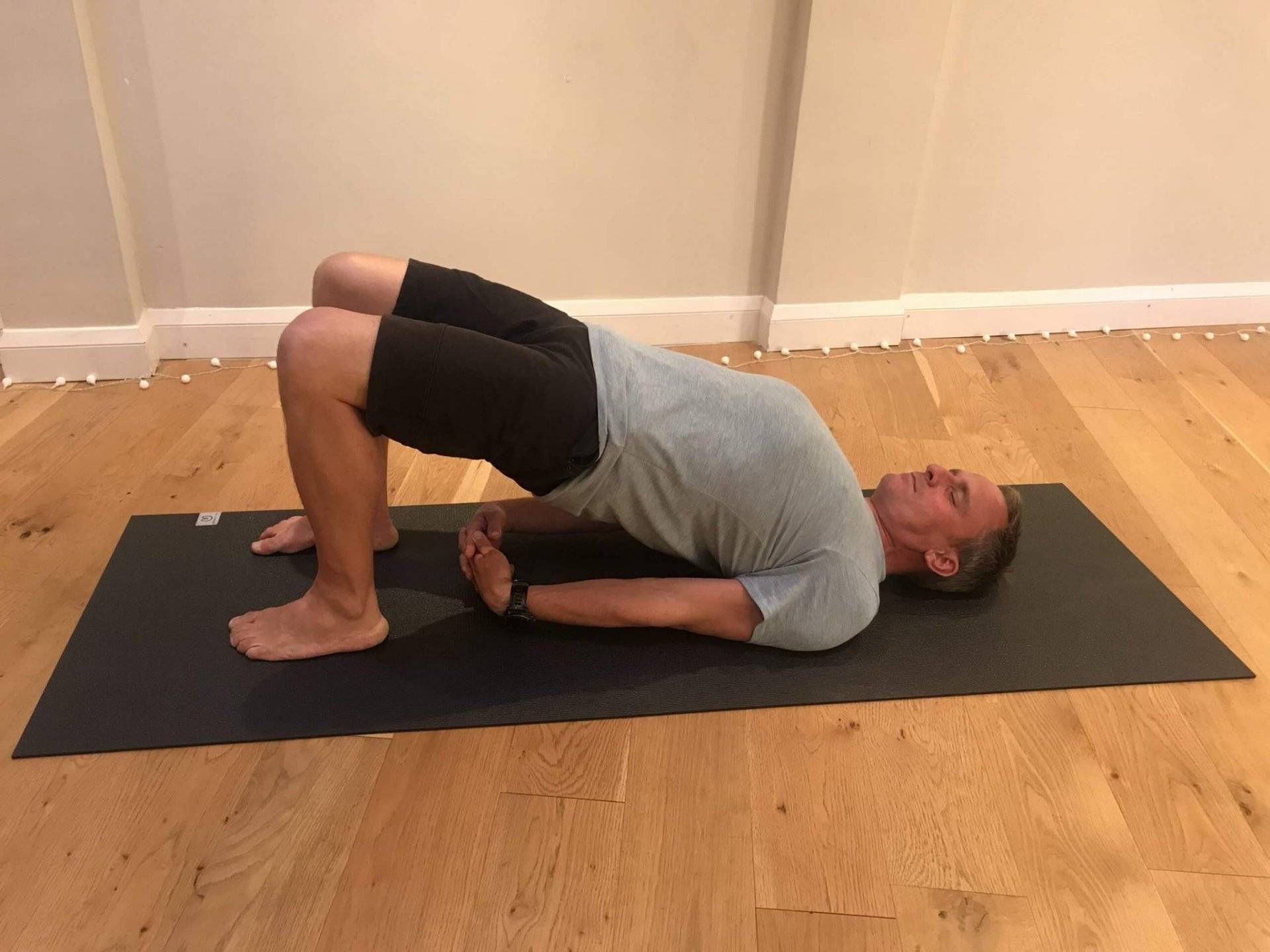 Bridge pose for lower back pain in Cookham.
