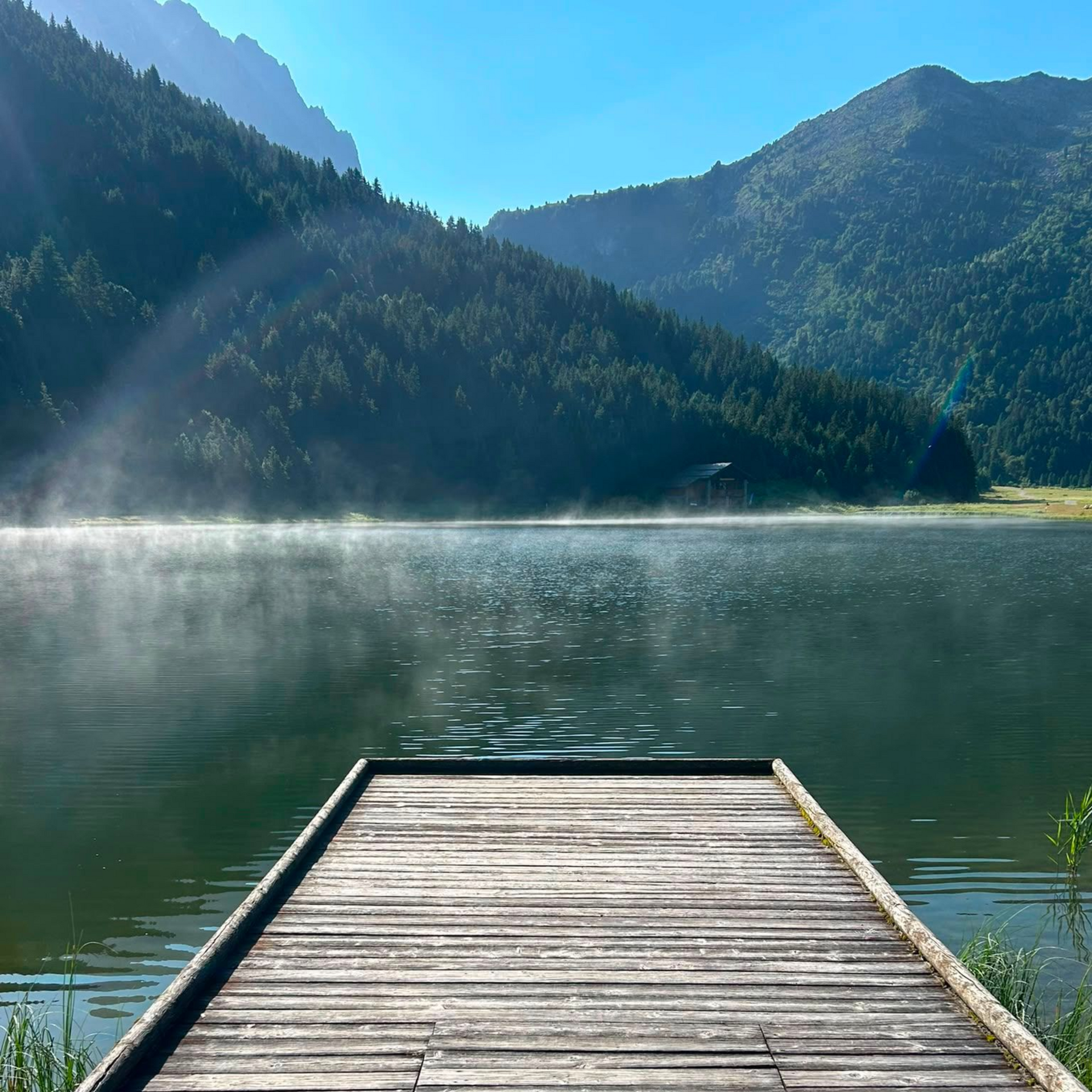 A view of a mountain lake taken on a hike from Meribel-Mottaret, France