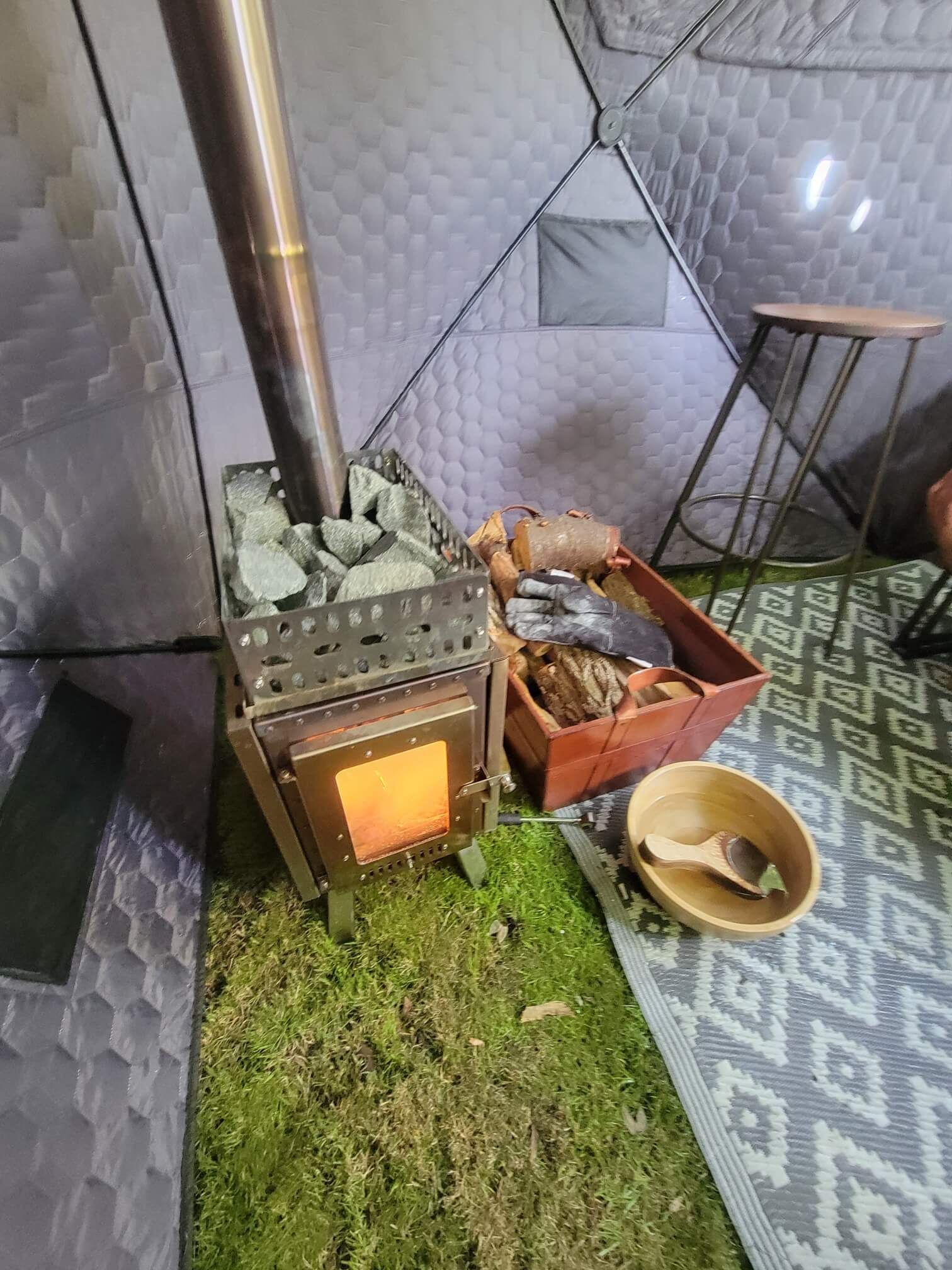 Enjoy the experience of our log burning sauna tent