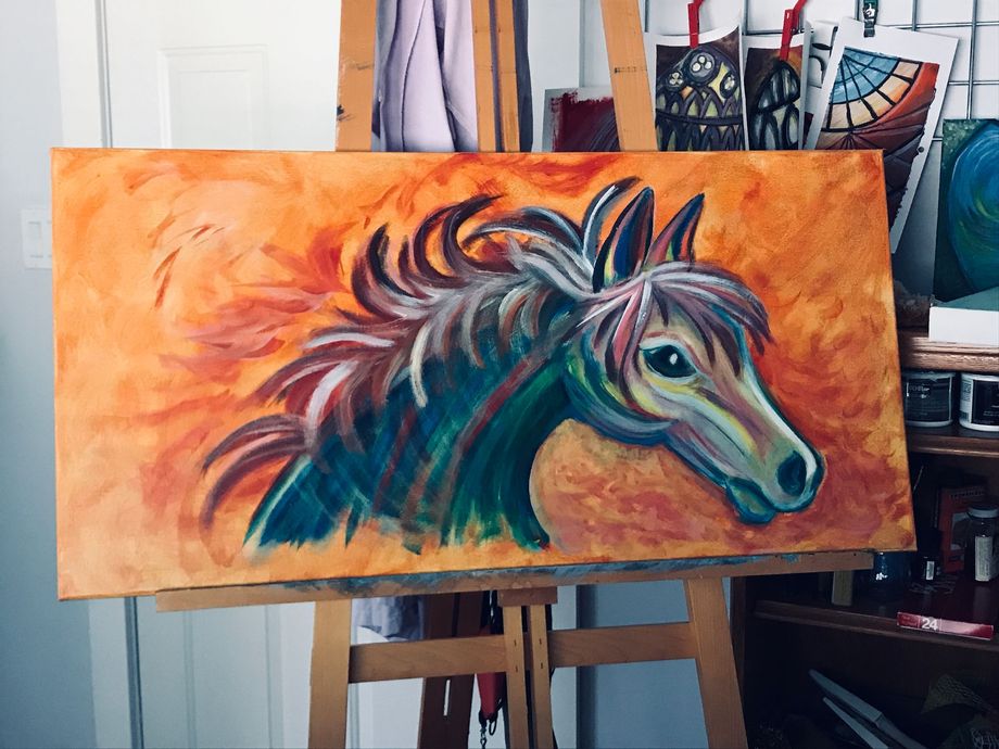 colourful horse painting on large canvas