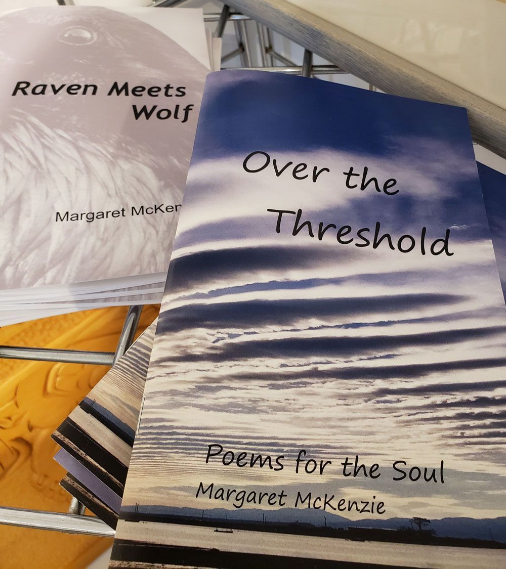 Poetry books for sale by Margaret McKenzie Raven Meets Wolf and Over the Threshold 