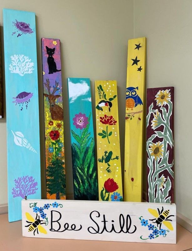 House post totems painted by seniors at the D'Esterre Centre Comox guided by Margaret McKenzie