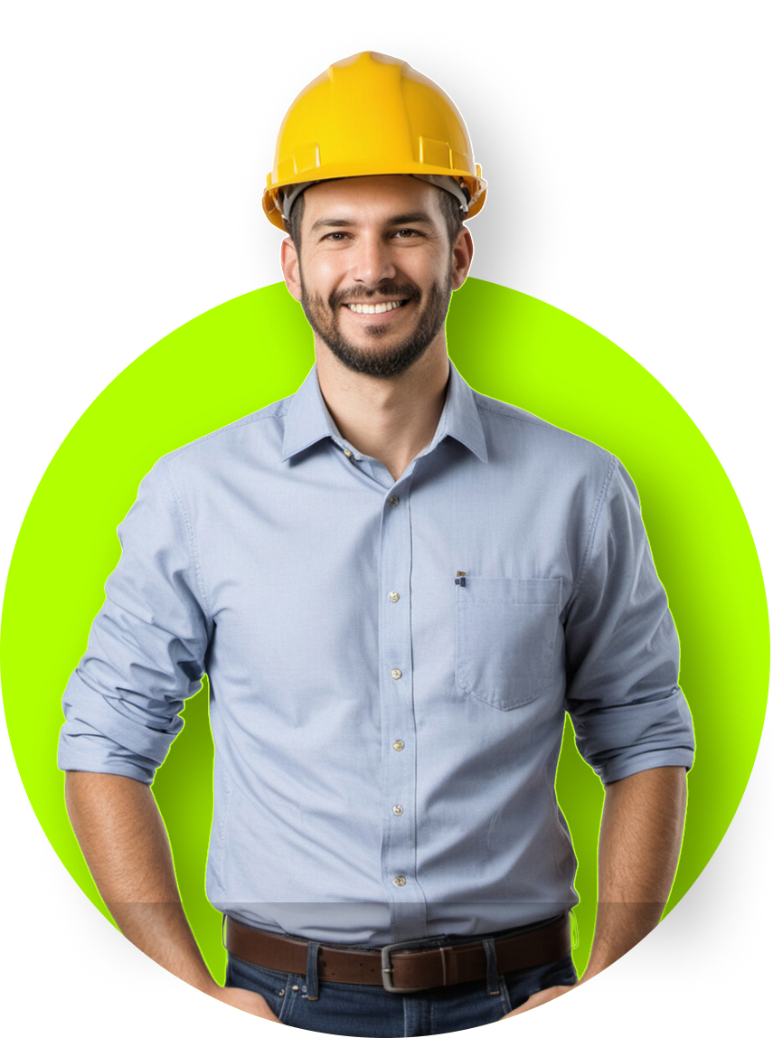 Smiling man with a beard wearing a yellow hard hat and blue shirt, arms at sides