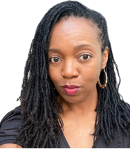 Portrait of a woman with long braids, hoop earrings, and a neutral expression on a white background