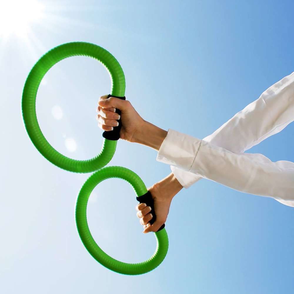 Hands holding Smovey rings with correct relaxed grip