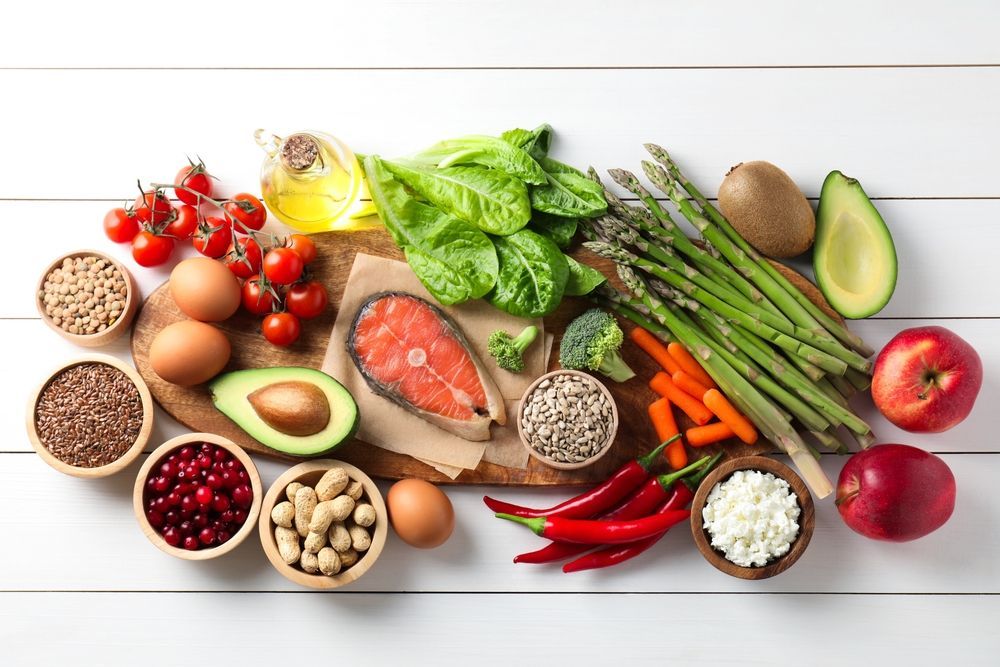 There are many different types of food on the table.