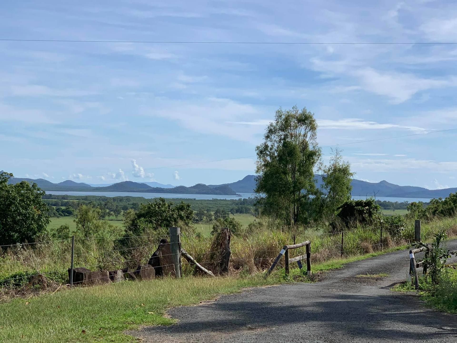 Gravel Road Leading to a Scenic Landscape — Bayview Canine Lodge In Habana, QLD