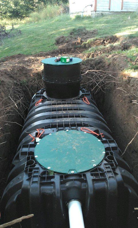 Black Septic Tank — Deerbourne, MO — Carl’s Septic Tank & Excavating Black Septic Tank — Deerbourne, MO — Carl’s Septic Tank & Excavating