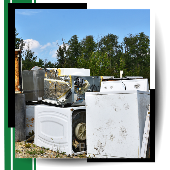 A row of discarded old appliance with graphics around it.
