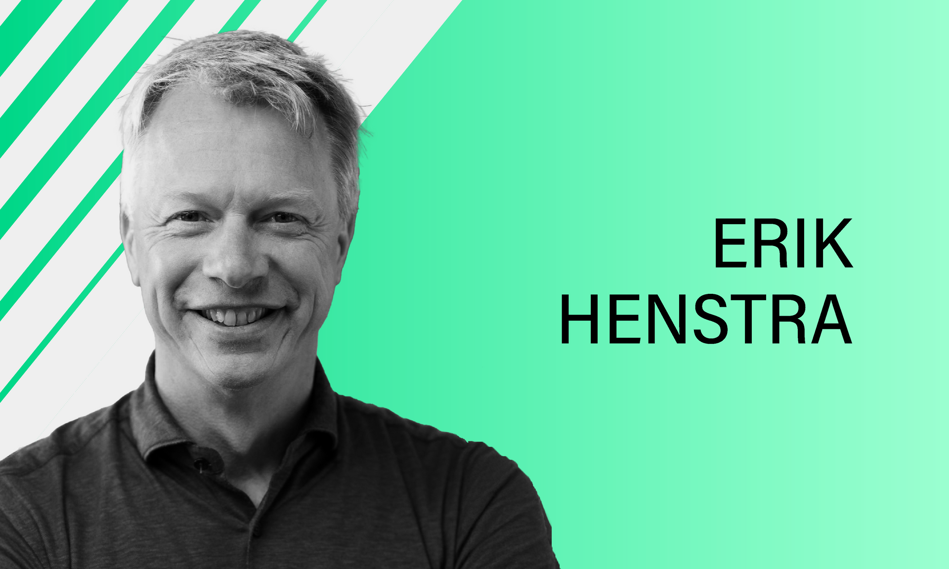 Portrait of Erik Henstra, smiling, against a background of diagonal green and white stripes.
