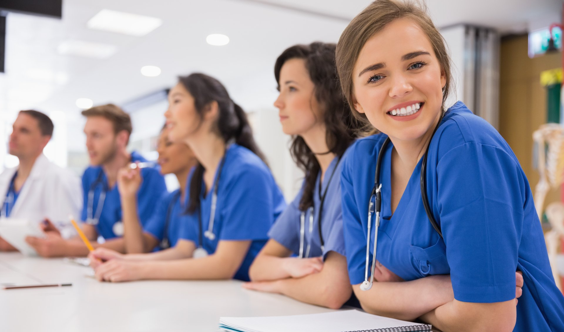 NHS workers lined up at a meeting