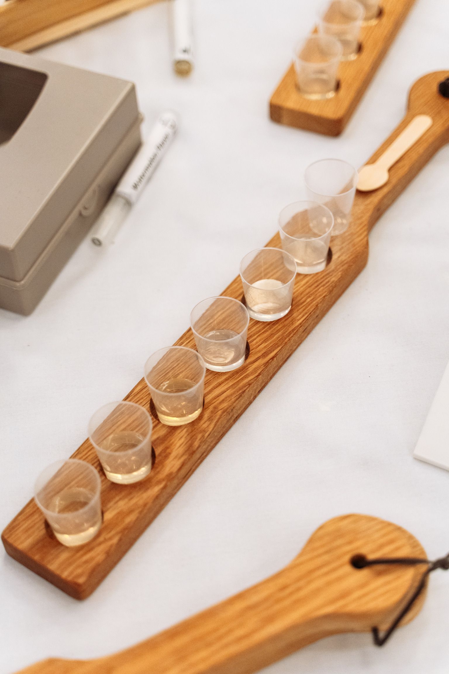 Clear cups containing flavor samples for testing new flavors.